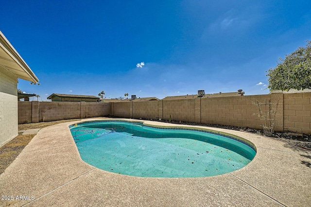 view of pool with a fenced backyard and a fenced in pool