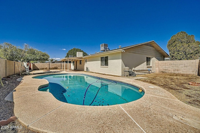 view of pool with a fenced in pool, central AC unit, a fenced backyard, and a patio area