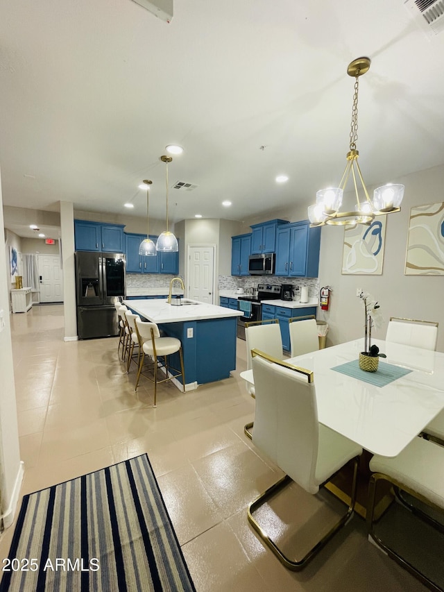 7136 N 73rd Dr, Glendale, AZ 85303 - dining space featuring light tile patterned floors, a notable chandelier, visible vents, and recessed lighting