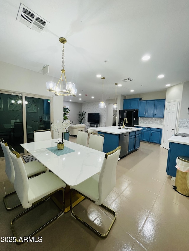 7136 N 73rd Dr, Glendale, AZ 85303 - dining space with a notable chandelier, visible vents, and recessed lighting