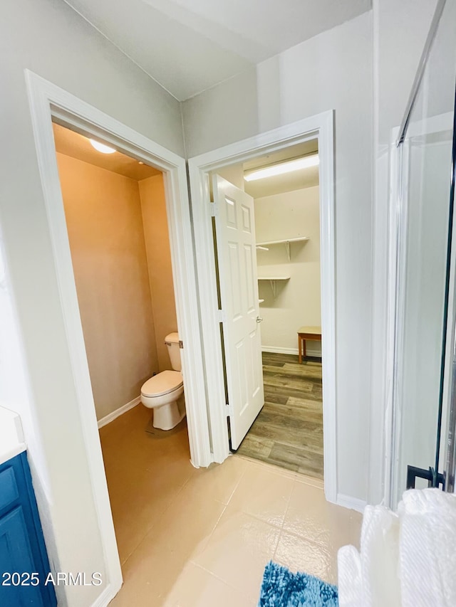 7136 N 73rd Dr, Glendale, AZ 85303 - full bath with tile patterned floors, toilet, and baseboards