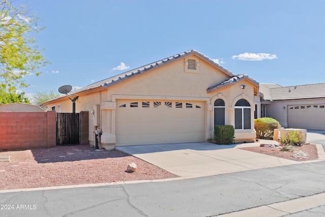 view of front of property with a garage