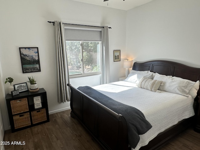 bedroom featuring dark hardwood / wood-style flooring