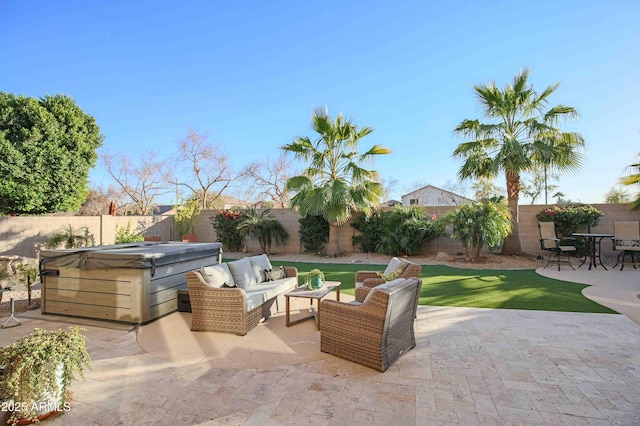 view of patio / terrace featuring an outdoor hangout area and a hot tub