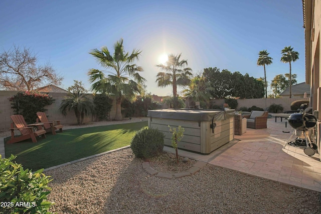 exterior space featuring a hot tub and a patio