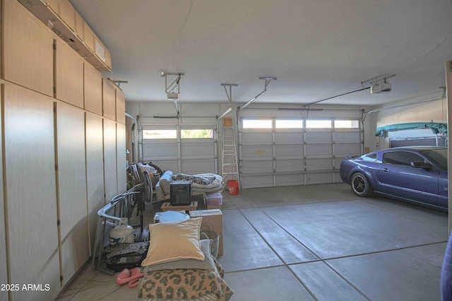 garage featuring a garage door opener