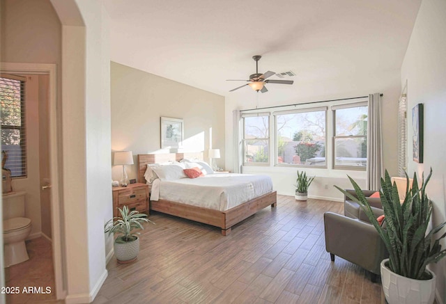 bedroom with ceiling fan and wood-type flooring