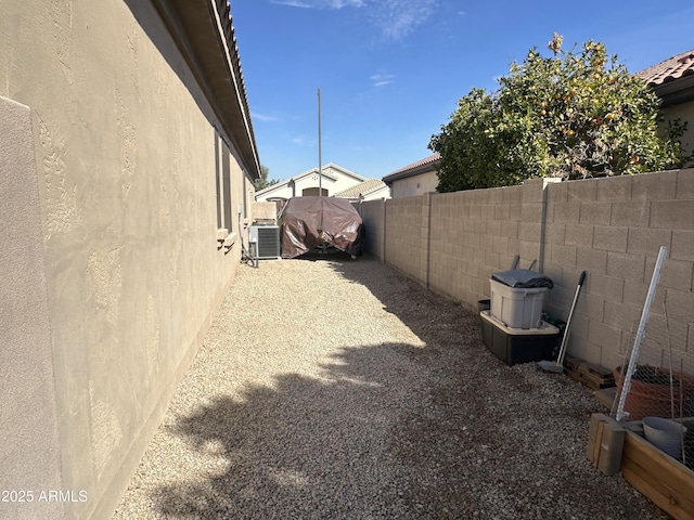 view of yard featuring central AC