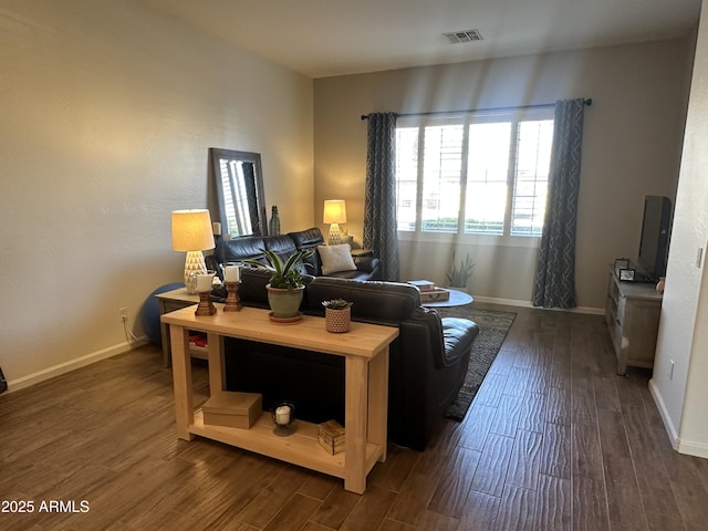 living room featuring dark hardwood / wood-style flooring