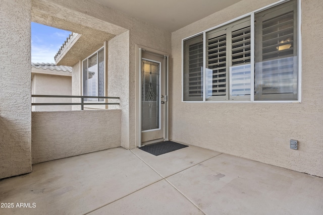 16013 S Desert Foothills Pkwy Unit 2120, Phoenix, AZ 85048 - entrance to property with stucco siding, a balcony, a patio area, and a tiled roof