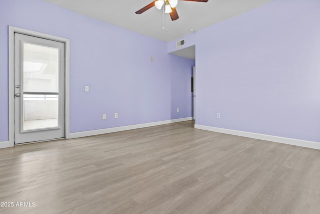 16013 S Desert Foothills Pkwy Unit 2120, Phoenix, AZ 85048 - empty room featuring visible vents, baseboards, ceiling fan, and light wood-style flooring
