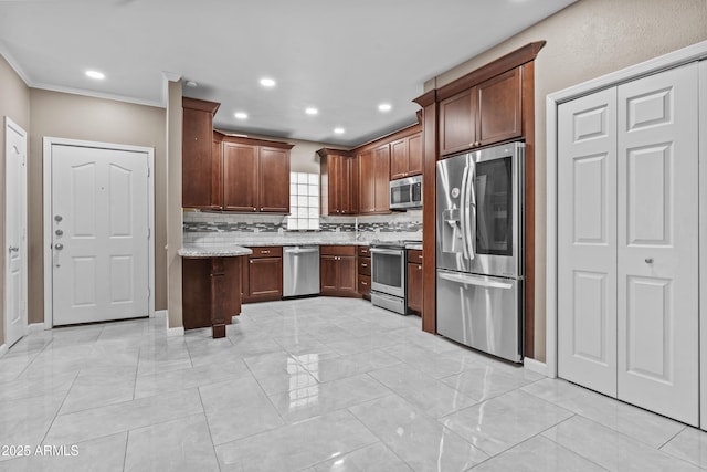 16013 S Desert Foothills Pkwy Unit 2120, Phoenix, AZ 85048 - kitchen with tasteful backsplash, crown molding, light stone countertops, recessed lighting, and stainless steel appliances