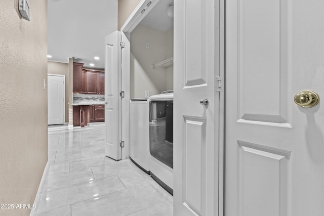 16013 S Desert Foothills Pkwy Unit 2120, Phoenix, AZ 85048 - washroom featuring laundry area, light tile patterned floors, recessed lighting, and independent washer and dryer