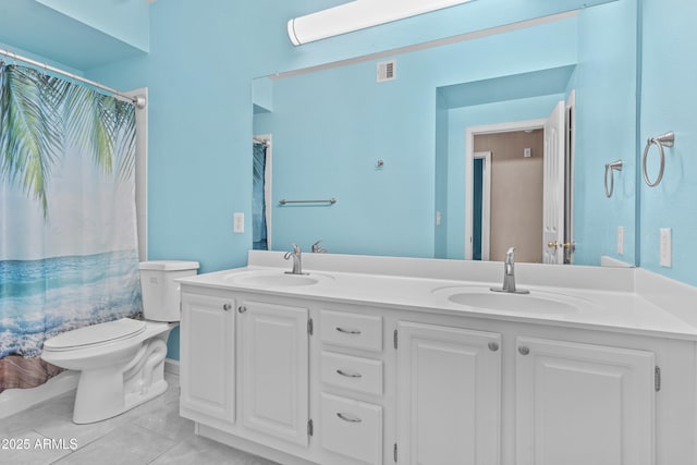 16013 S Desert Foothills Pkwy Unit 2120, Phoenix, AZ 85048 - bathroom with double vanity, visible vents, toilet, and a sink