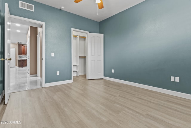 16013 S Desert Foothills Pkwy Unit 2120, Phoenix, AZ 85048 - unfurnished bedroom with visible vents, baseboards, and light wood-style floors