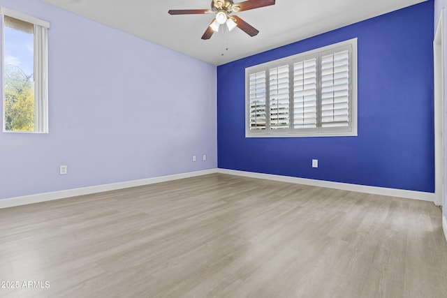 16013 S Desert Foothills Pkwy Unit 2120, Phoenix, AZ 85048 - unfurnished room with baseboards, ceiling fan, and wood finished floors