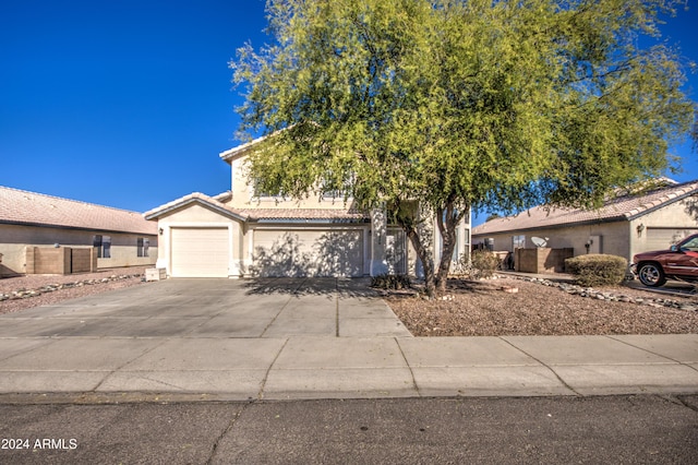 view of front of property featuring a garage