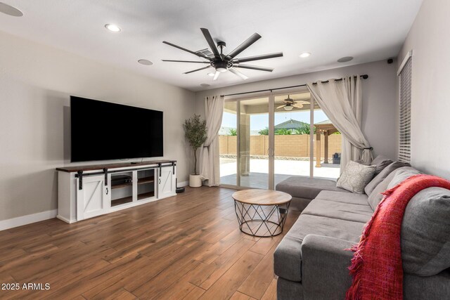 40470 W Agave Rd, Maricopa, AZ 85138 - living area with ceiling fan, wood finished floors, baseboards, and recessed lighting