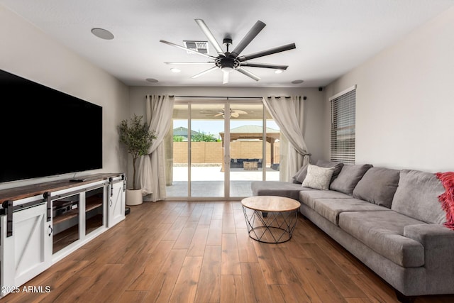 40470 W Agave Rd, Maricopa, AZ 85138 - living area featuring ceiling fan, wood finished floors, and recessed lighting
