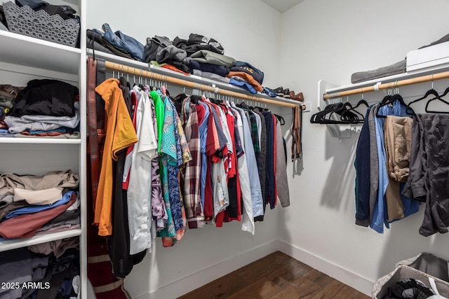 40470 W Agave Rd, Maricopa, AZ 85138 - walk in closet with wood finished floors
