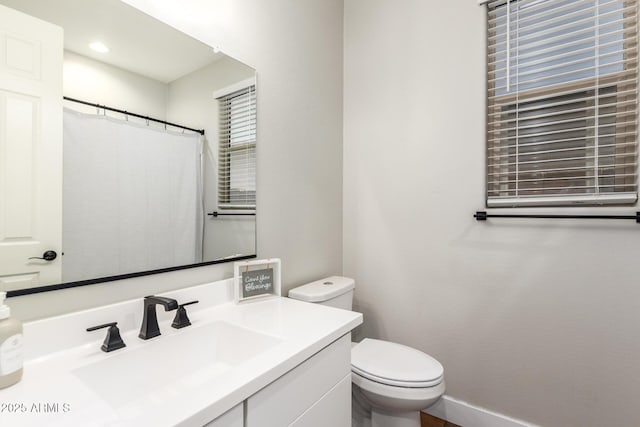 40470 W Agave Rd, Maricopa, AZ 85138 - bathroom featuring toilet, vanity, and recessed lighting