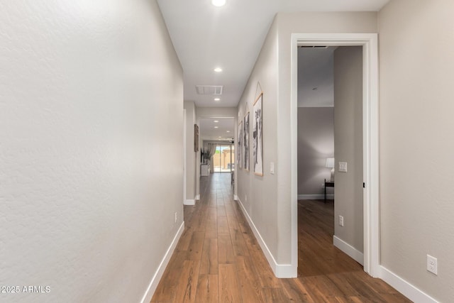 40470 W Agave Rd, Maricopa, AZ 85138 - corridor with wood finished floors, baseboards, and recessed lighting