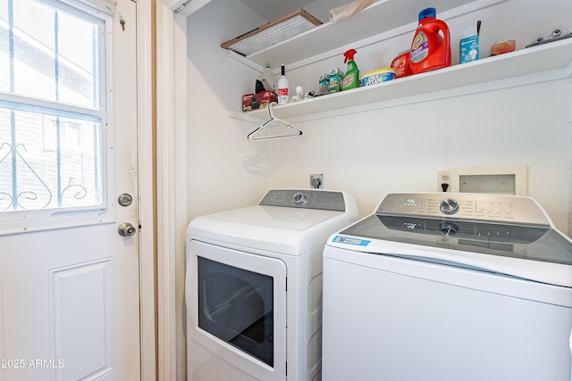 washroom with laundry area and washer and clothes dryer