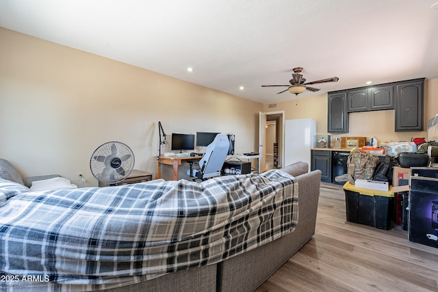 bedroom with wine cooler, recessed lighting, visible vents, light wood-style floors, and freestanding refrigerator