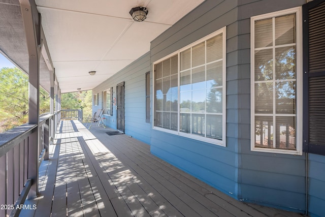 wooden deck featuring a porch