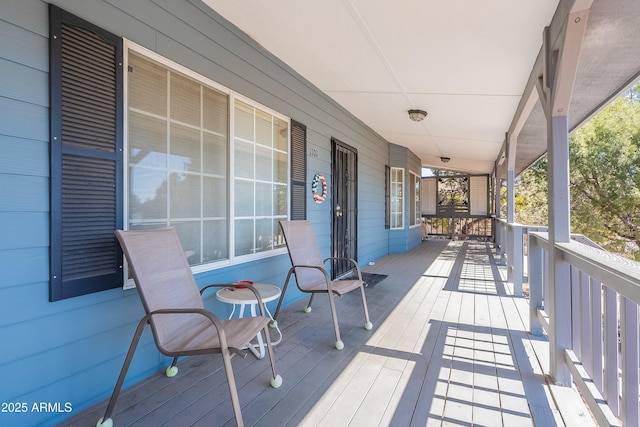 wooden deck with a porch