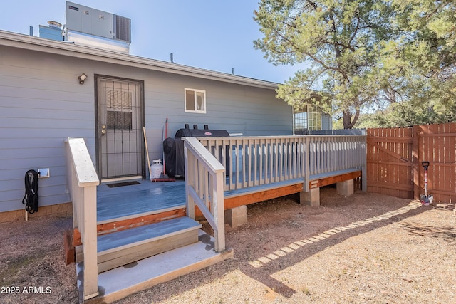 wooden deck featuring fence