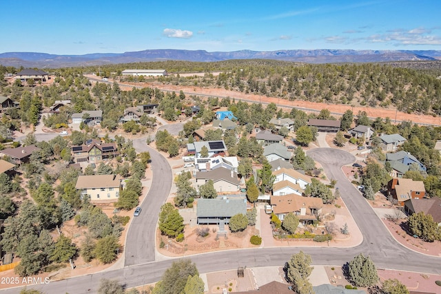 birds eye view of property featuring a residential view and a mountain view