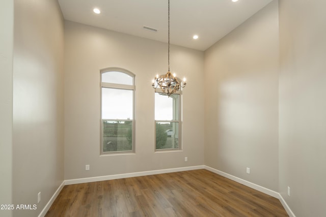 14110 E Hard Rock Rd, Prescott Valley, AZ 86315 - unfurnished room featuring wood finished floors, a chandelier, baseboards, and recessed lighting