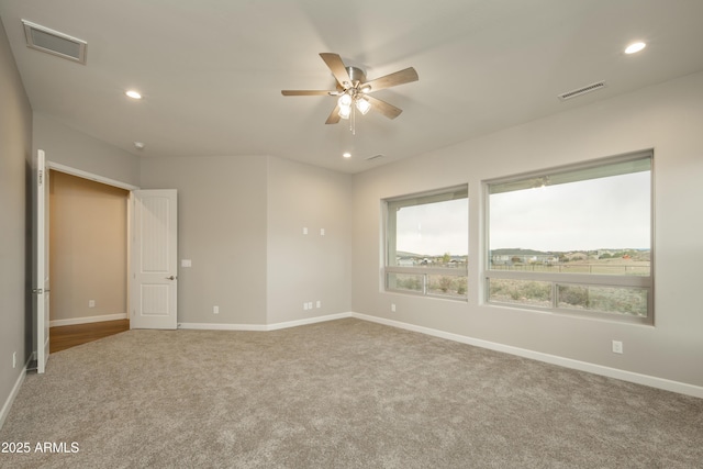 14110 E Hard Rock Rd, Prescott Valley, AZ 86315 - unfurnished room with carpet flooring, a ceiling fan, recessed lighting, and baseboards