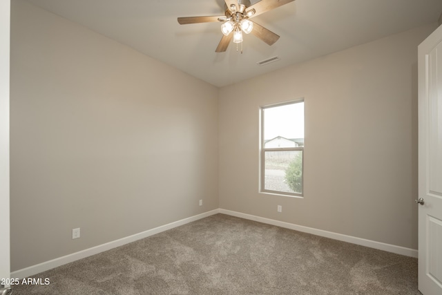 14110 E Hard Rock Rd, Prescott Valley, AZ 86315 - carpeted empty room featuring baseboards and a ceiling fan