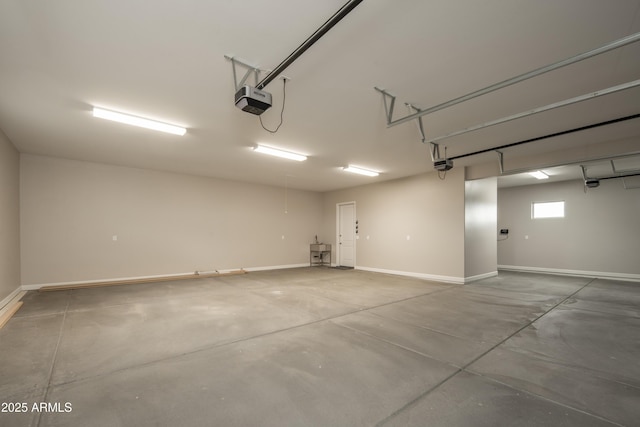 14110 E Hard Rock Rd, Prescott Valley, AZ 86315 - garage with a garage door opener and baseboards