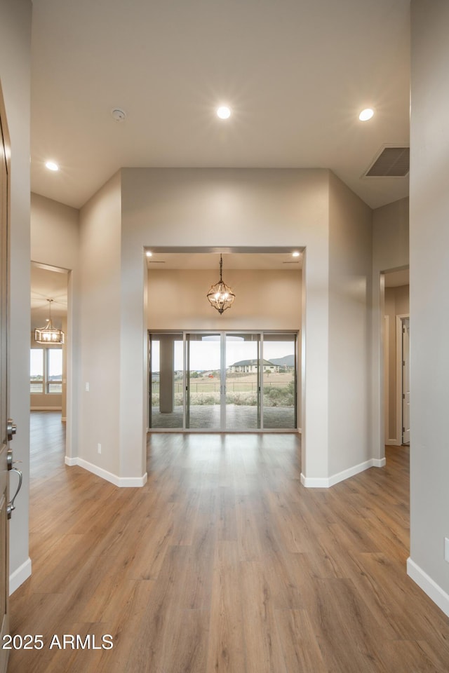 14110 E Hard Rock Rd, Prescott Valley, AZ 86315 - spare room featuring a chandelier, plenty of natural light, baseboards, and recessed lighting