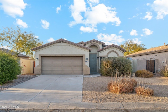 view of front of property featuring a garage