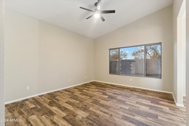 unfurnished room with wood-type flooring, high vaulted ceiling, and ceiling fan