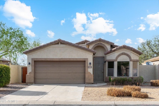 6658 E San Cristobal Way, Gold Canyon, AZ 85118 - view of front of property with driveway, stucco siding, a garage, and a gate