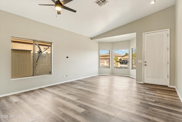 6658 E San Cristobal Way, Gold Canyon, AZ 85118 - unfurnished room featuring a ceiling fan, lofted ceiling, wood finished floors, and baseboards