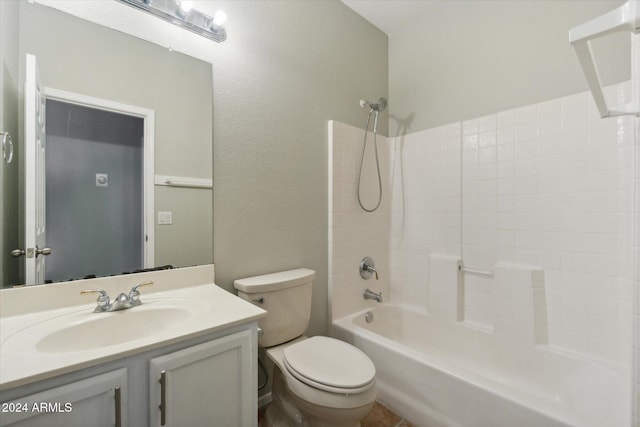 full bathroom featuring shower / washtub combination, vanity, and toilet