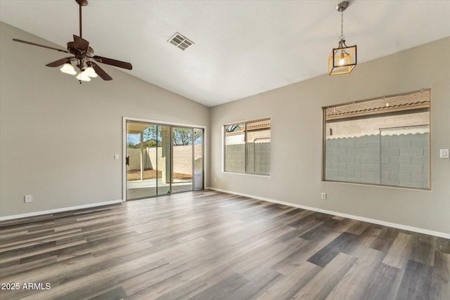 6658 E San Cristobal Way, Gold Canyon, AZ 85118 - unfurnished room featuring ceiling fan, wood finished floors, vaulted ceiling, and baseboards