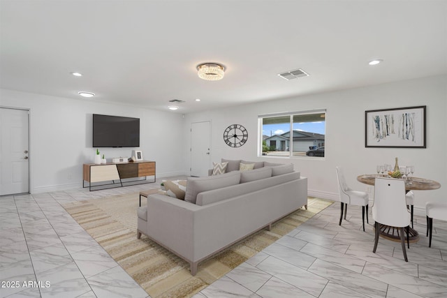 living room featuring recessed lighting, visible vents, marble finish floor, and baseboards