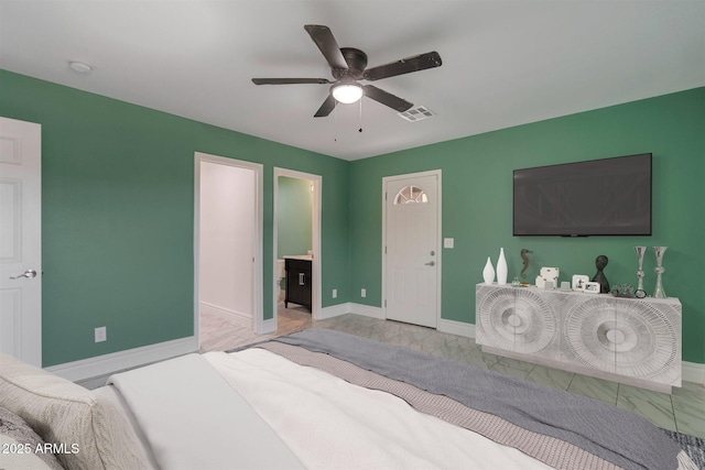 bedroom featuring baseboards, a ceiling fan, and visible vents