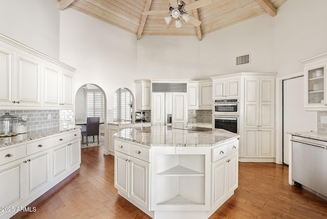 10205 E Corrine Dr, Scottsdale, AZ 85260 - kitchen featuring high vaulted ceiling, open shelves, ceiling fan, wood ceiling with exposed beams, and tasteful backsplash