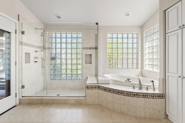 10205 E Corrine Dr, Scottsdale, AZ 85260 - full bathroom featuring a shower stall, a garden tub, and tile patterned floors