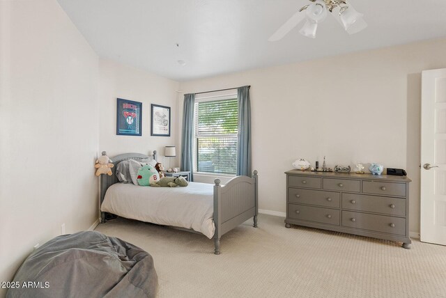 10205 E Corrine Dr, Scottsdale, AZ 85260 - bedroom with light colored carpet, baseboards, and ceiling fan