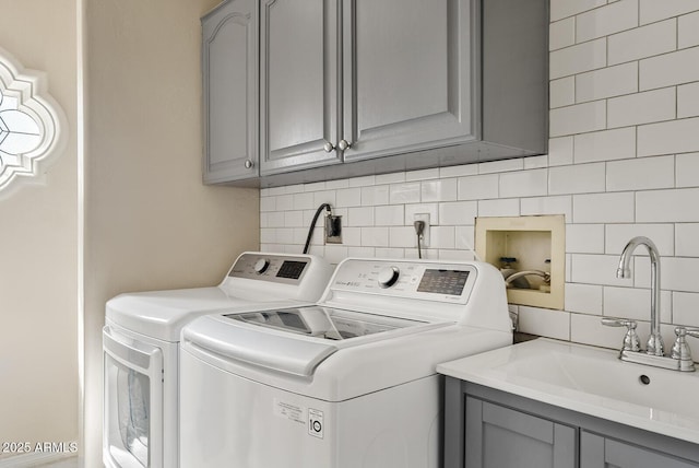 10205 E Corrine Dr, Scottsdale, AZ 85260 - laundry area featuring cabinet space and washing machine and clothes dryer