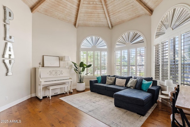 10205 E Corrine Dr, Scottsdale, AZ 85260 - living room with wood ceiling with exposed beams, hardwood / wood-style floors, baseboards, and high vaulted ceiling